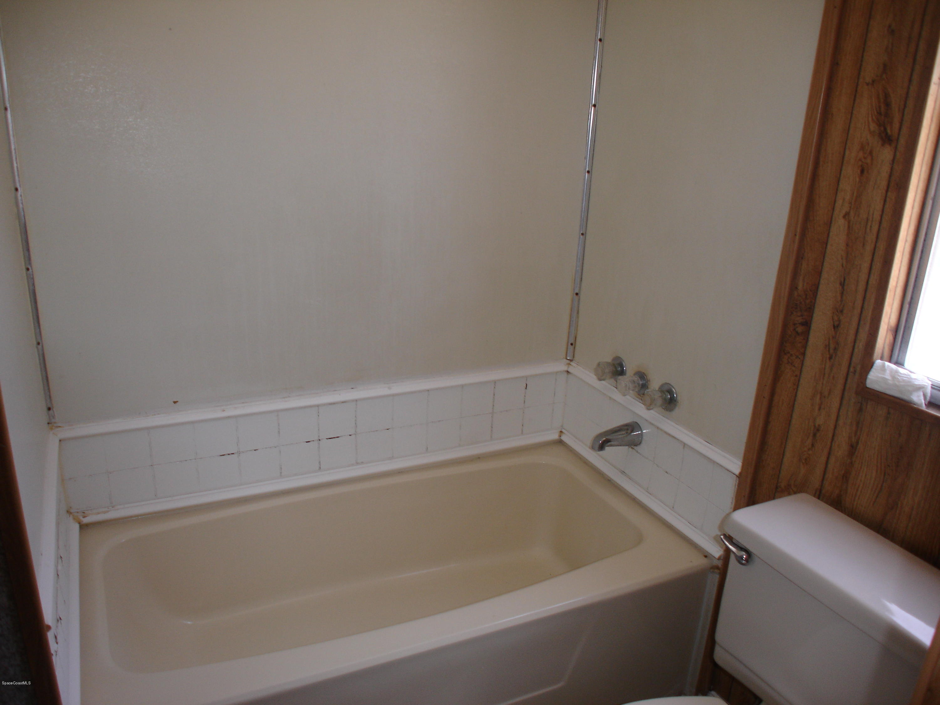 2553 Amberly Road Northeast Palm Bay, FL 32905 - Photo 9 of 26 TUB SHOWER COMBO
