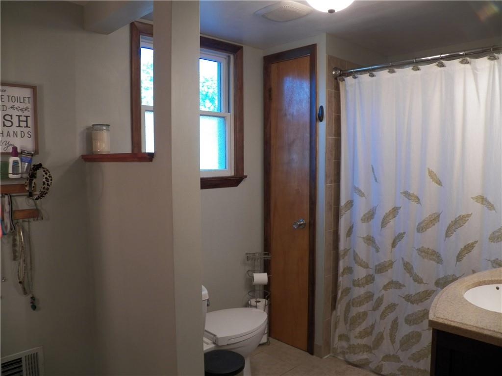 600 Sarver Road Sarver, PA 16055 - Photo 13 of 19 a bathroom with a toilet and a shower