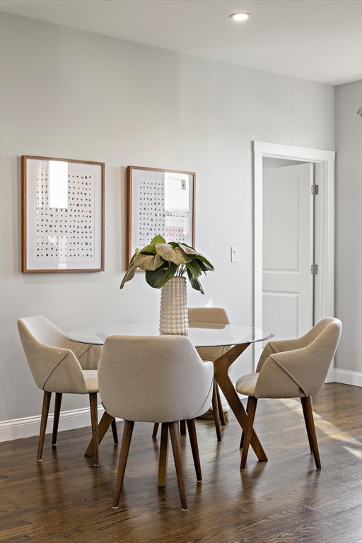 9-11 Boynton Street, Unit 2 Boston, MA 02130 - Photo 16 of 30 a view of a dining room with furniture and wooden floor