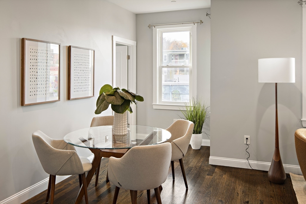 9-11 Boynton Street, Unit 2 Boston, MA 02130 - Photo 22 of 30 a dining room with furniture and window