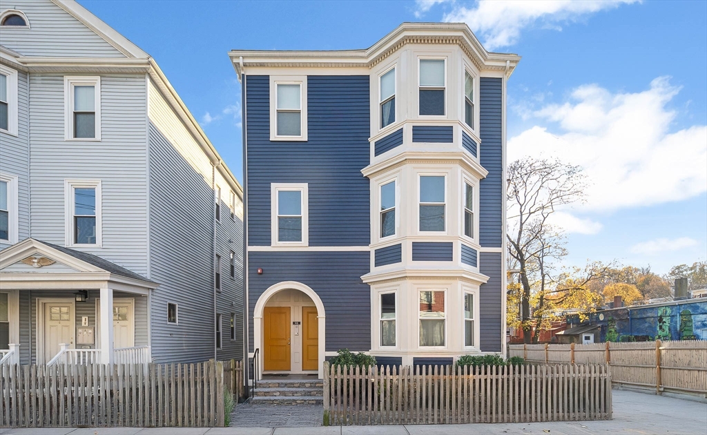 9-11 Boynton Street, Unit 2 Boston, MA 02130 - Photo 29 of 30 a front view of a house