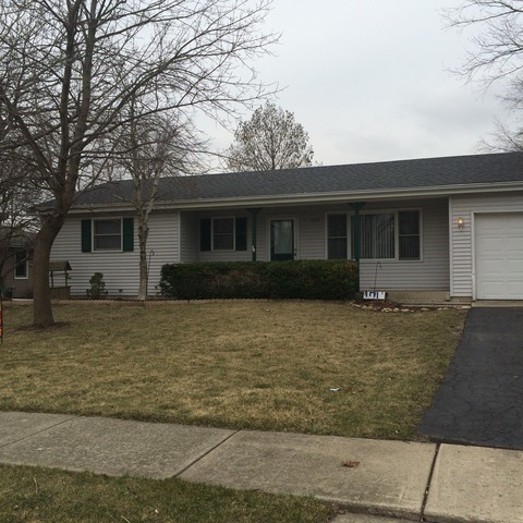 1023 South Cooper Road New Lenox, IL 60451 - Photo 1 of 21 a front view of a house with garden