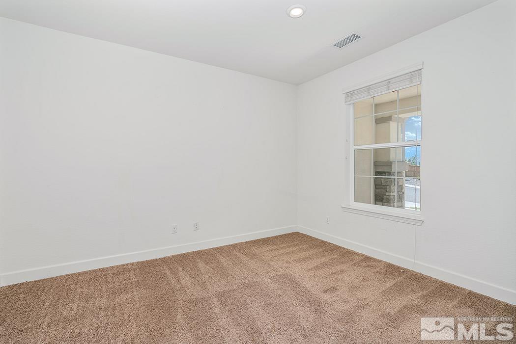 10410 Palladium Mine Drive Reno, NV 89521 - Photo 25 of 26 an empty room with a window