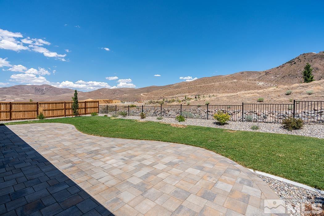 10410 Palladium Mine Drive Reno, NV 89521 - Photo 5 of 26 a view of a terrace with yard and mountain view in back