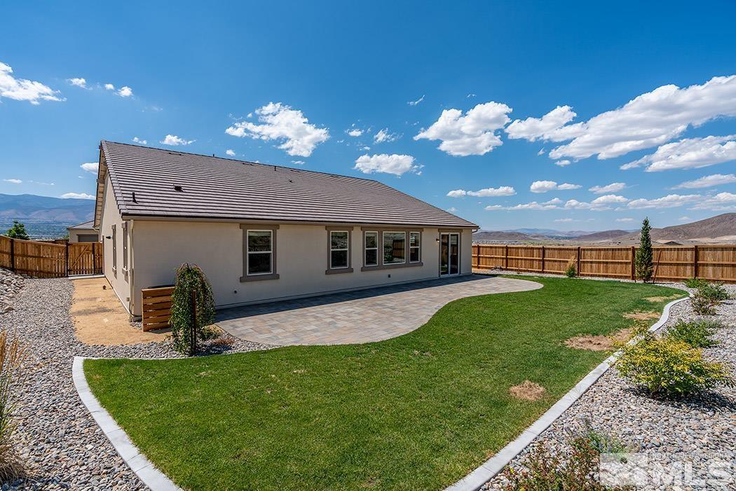 10410 Palladium Mine Drive Reno, NV 89521 - Photo 6 of 26 a front view of a house with garden