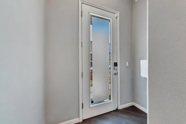 a view of front door with hallway
