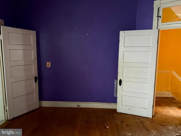 an empty room with a door