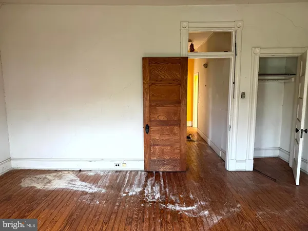 wooden floor and window in a room