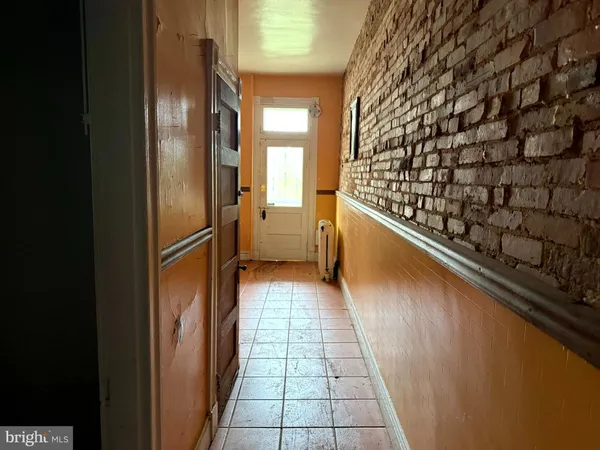 a hallway with a wooden floor