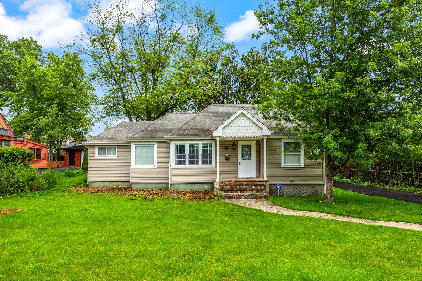 603 Greendale Road Glenview, IL 60025 - Photo 1 of 20 a front view of house with yard and green space
