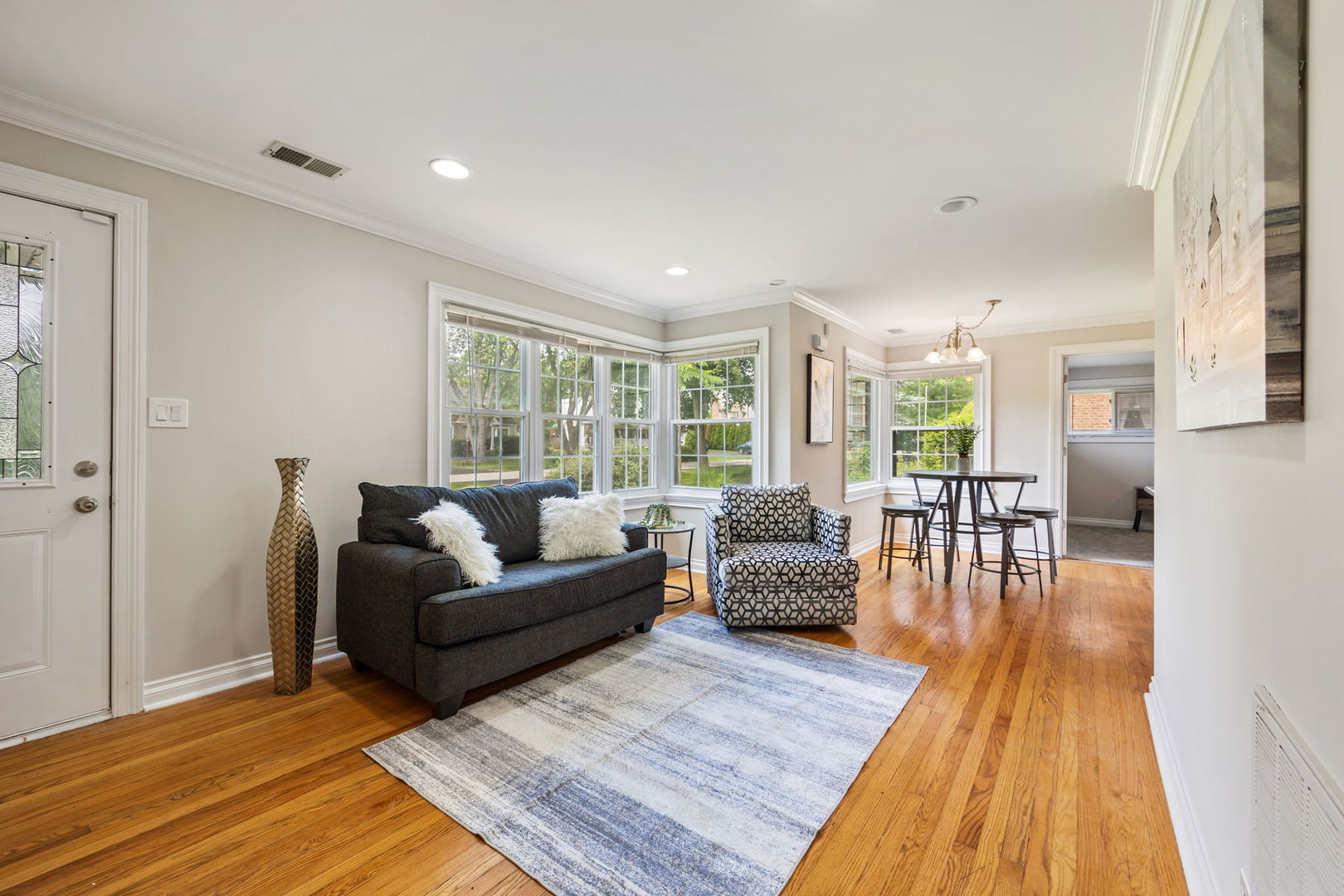 603 Greendale Road Glenview, IL 60025 - Photo 3 of 20 a living room with furniture and a wooden floor
