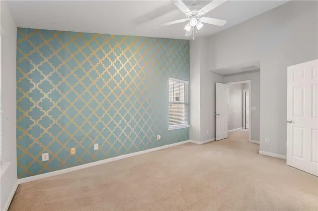 a view of an empty room and window