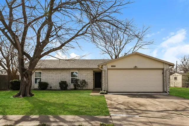 a front view of house with yard