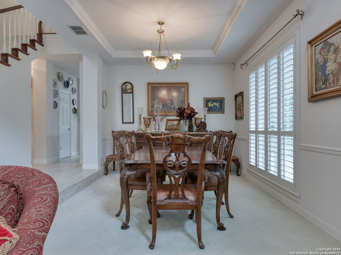 109 A Ammann Road Boerne, TX 78015 - Photo 13 of 67 a view of a dining room with furniture and a chandelier