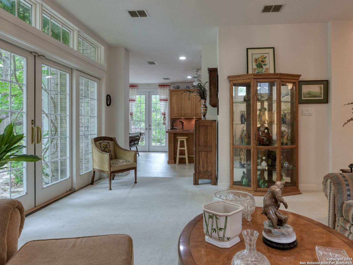 109 A Ammann Road Boerne, TX 78015 - Photo 22 of 67 a living room with furniture and a floor to ceiling window