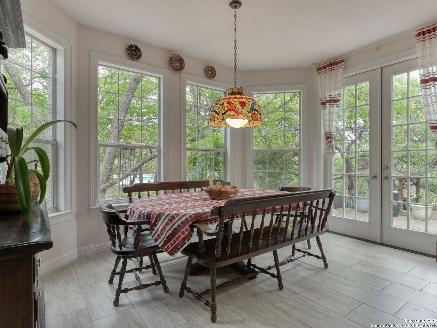 109 A Ammann Road Boerne, TX 78015 - Photo 26 of 67 a view of a dining room with furniture window and outside view