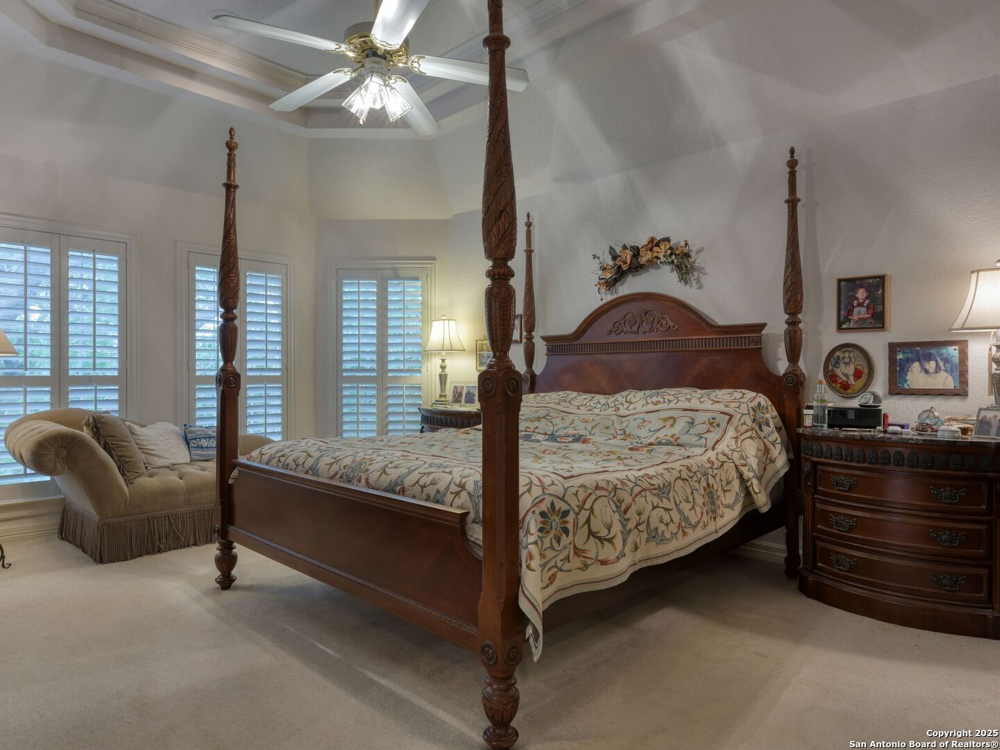 109 A Ammann Road Boerne, TX 78015 - Photo 31 of 67 a bedroom with a bed and a chandelier