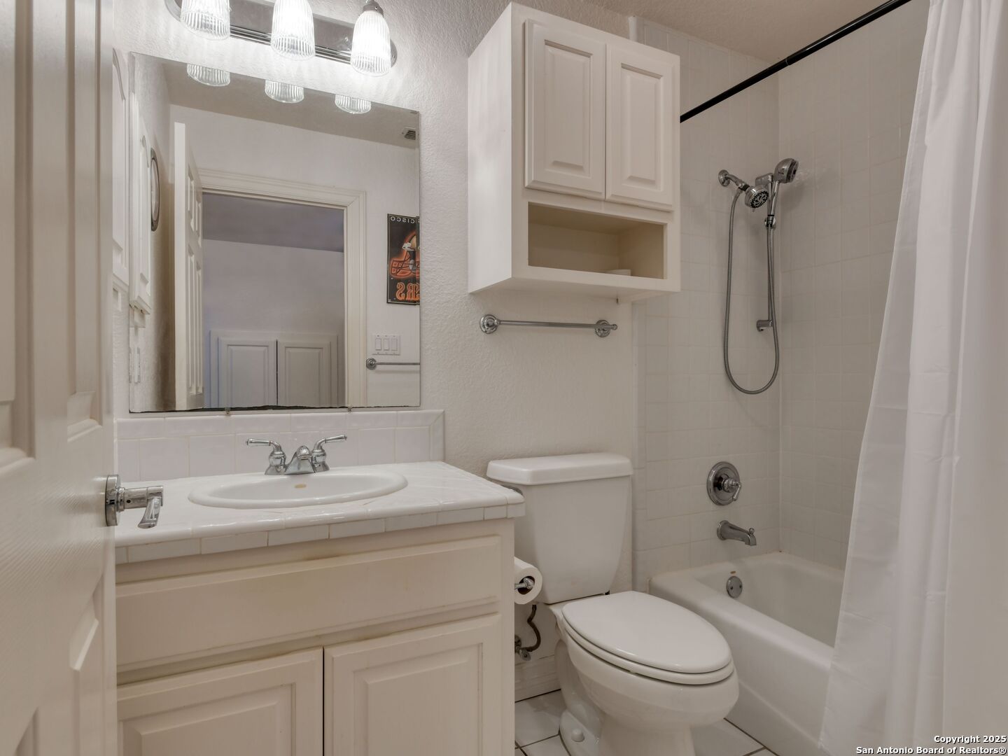 109 A Ammann Road Boerne, TX 78015 - Photo 37 of 67 a bathroom with a sink a toilet and shower