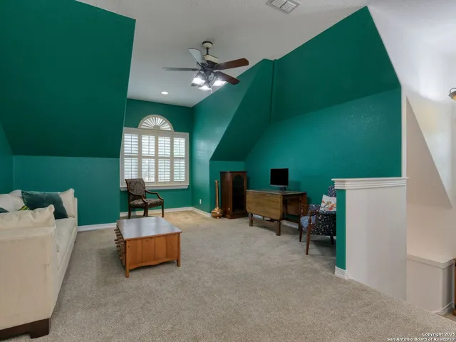 a view of a swimming pool with a yard