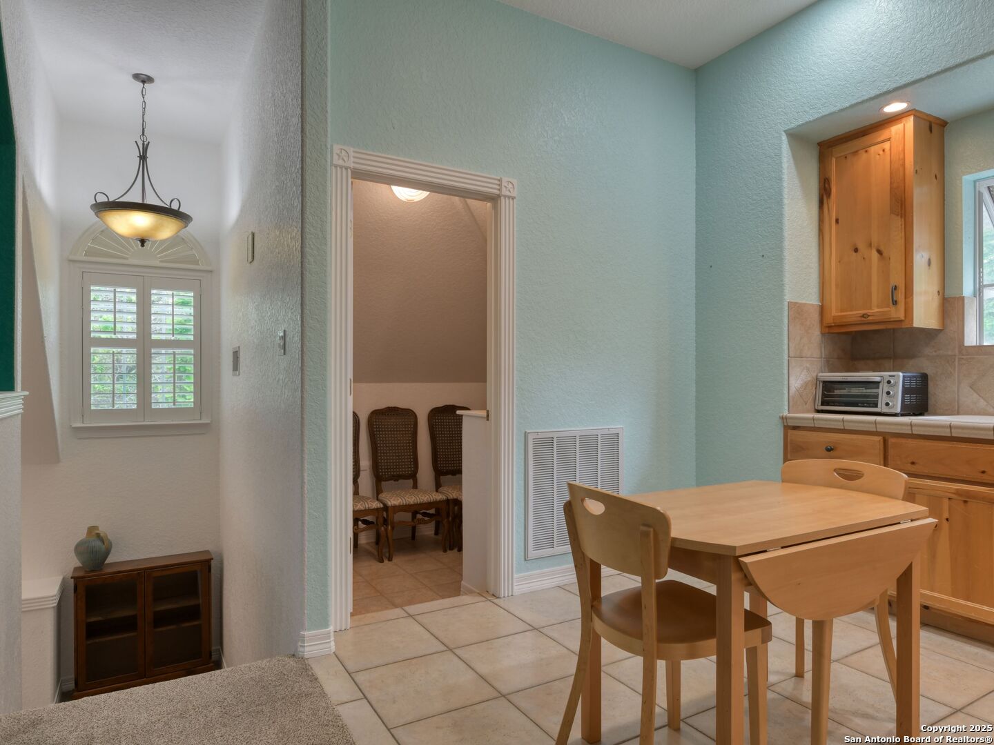 109 A Ammann Road Boerne, TX 78015 - Photo 47 of 67 a dining room with furniture and window