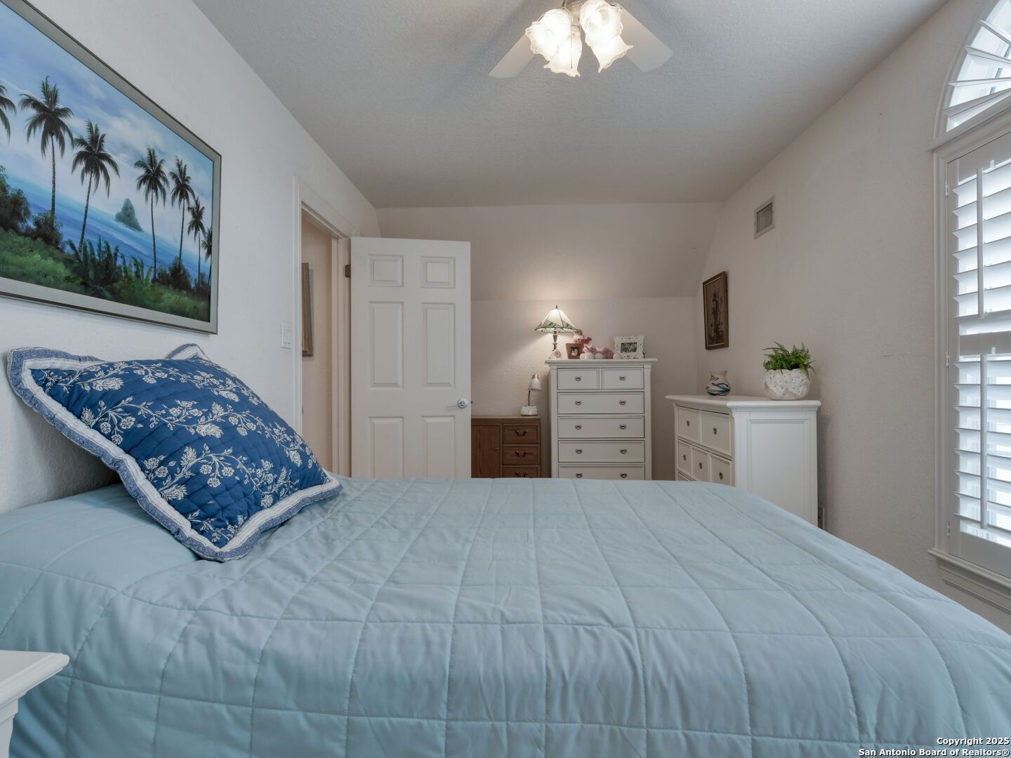 109 A Ammann Road Boerne, TX 78015 - Photo 49 of 67 a bedroom with a large bed and a window