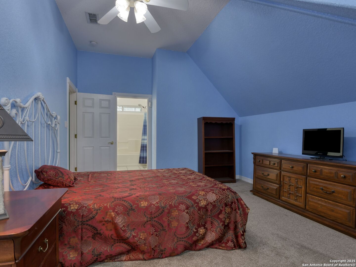 109 A Ammann Road Boerne, TX 78015 - Photo 51 of 67 a bedroom with a bed and a flat screen tv