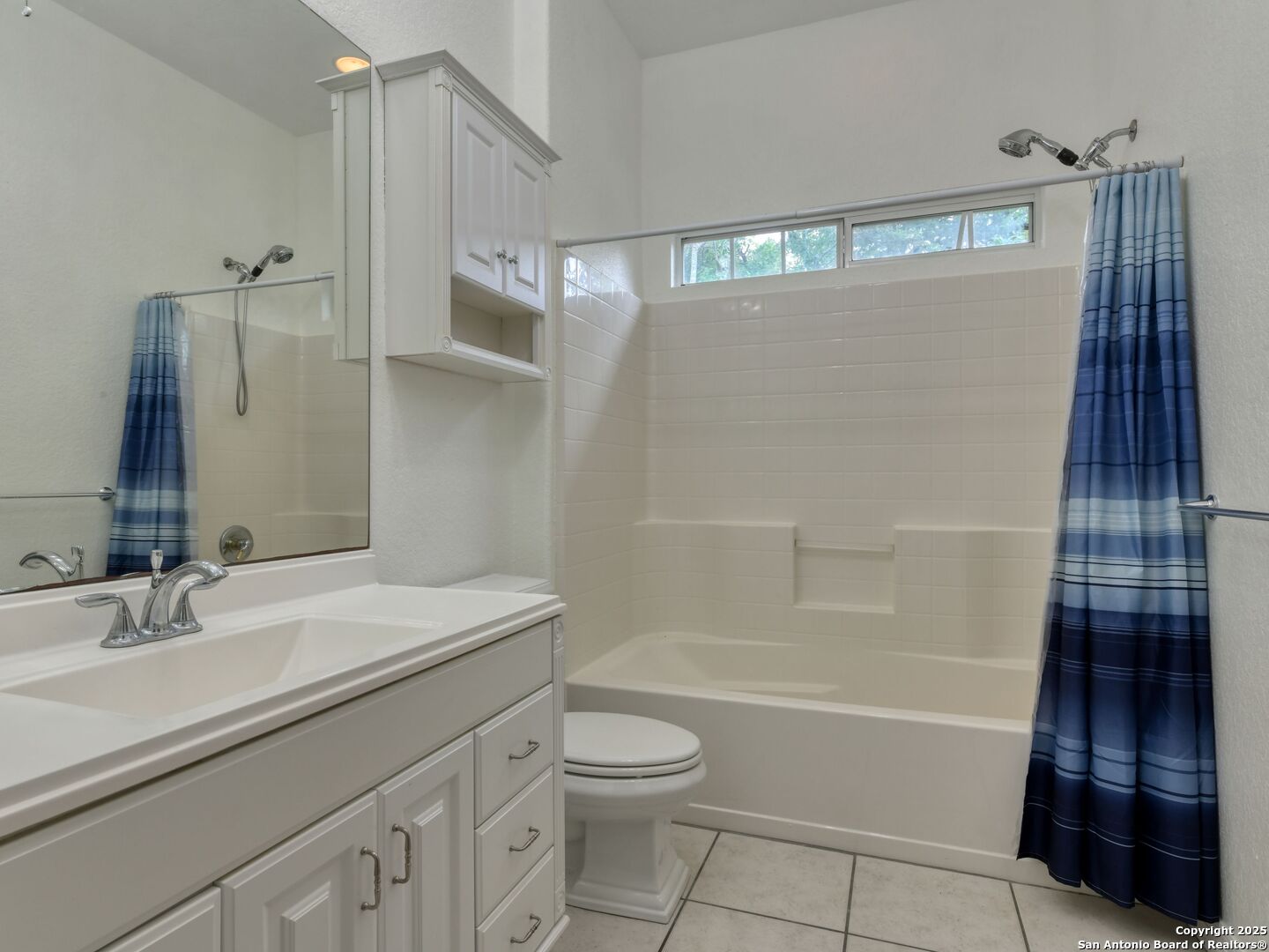 109 A Ammann Road Boerne, TX 78015 - Photo 52 of 67 a bathroom with a sink a toilet and shower
