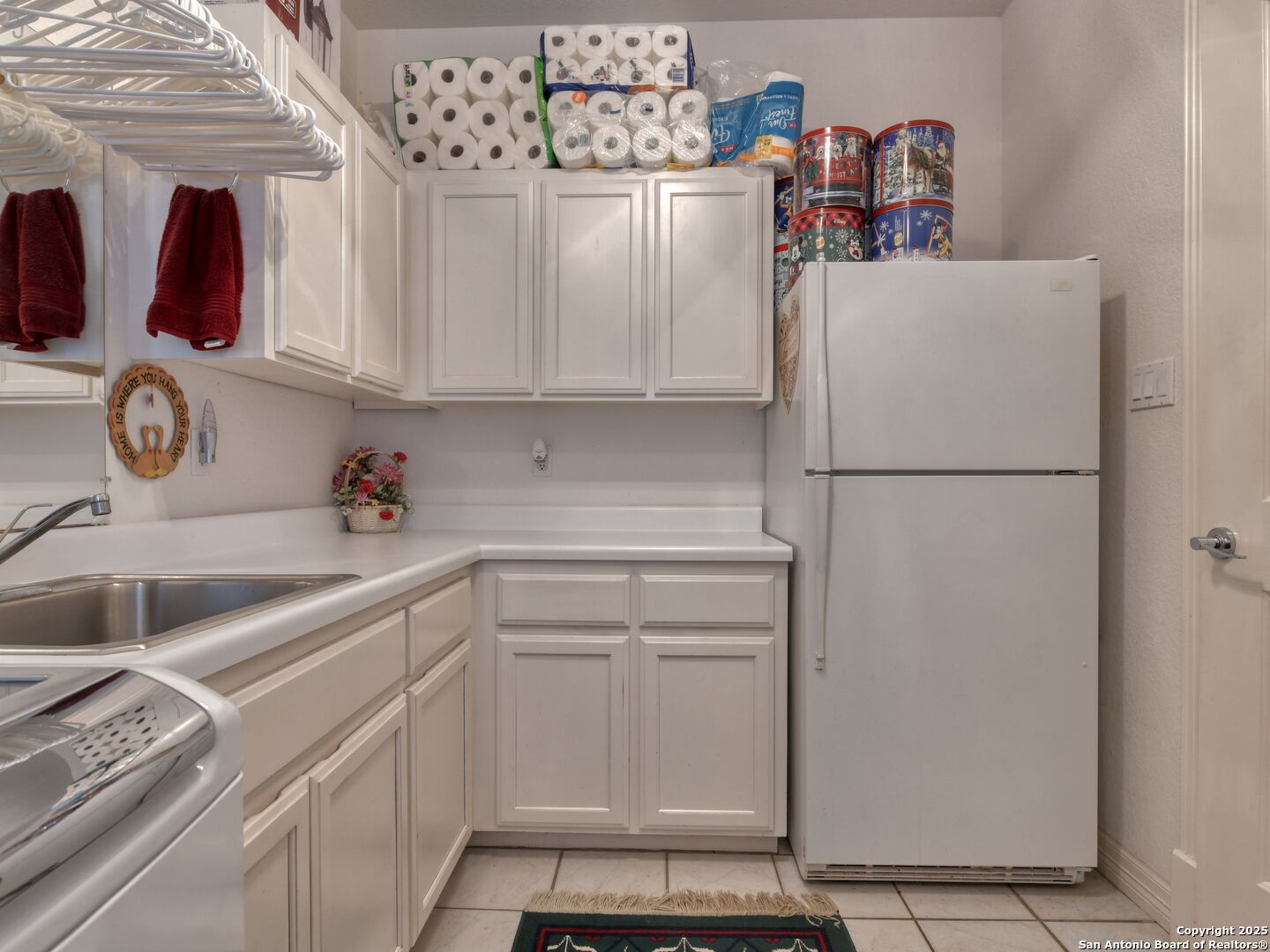 109 A Ammann Road Boerne, TX 78015 - Photo 53 of 67 a utility room with cabinets washer and dryer