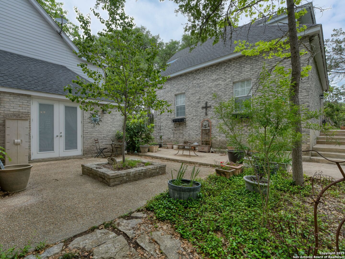 109 A Ammann Road Boerne, TX 78015 - Photo 59 of 67 a view of a house with backyard and sitting area