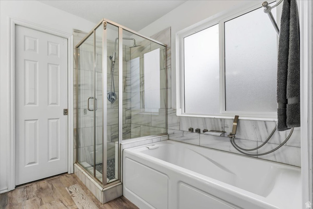 7975 Showcase Lane Sandy, UT 84094 - Photo 18 of 29 Updated Primary bedroom bath with jetted tub and large separate shower