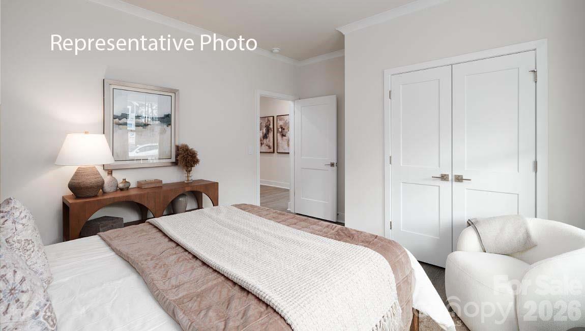 3205 Oberon Street York, SC 29745 - Photo 19 of 23 a bedroom with a bed and a couch