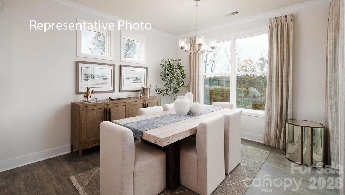 3205 Oberon Street York, SC 29745 - Photo 7 of 23 a kitchen with a sink a counter top space and stainless steel appliances