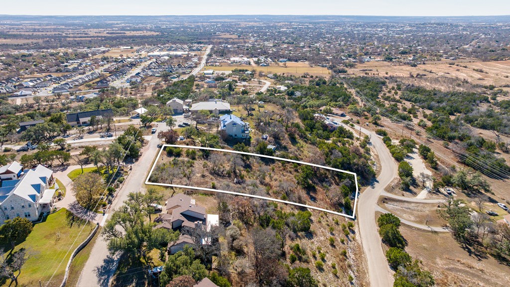 21 Scenic Ridge Drive, Unit 21 Fredericksburg, TX 78624 - Photo 2 of 19 an aerial view of residential houses with outdoor space