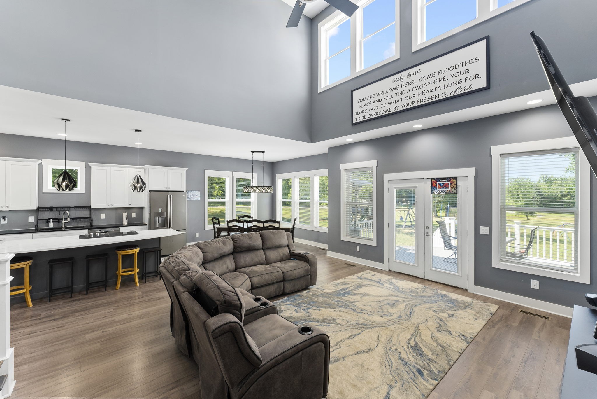 4217 Sandy Springs Road Springfield, TN 37172 - Photo 14 of 50 a living room filled with furniture windows and kitchen view