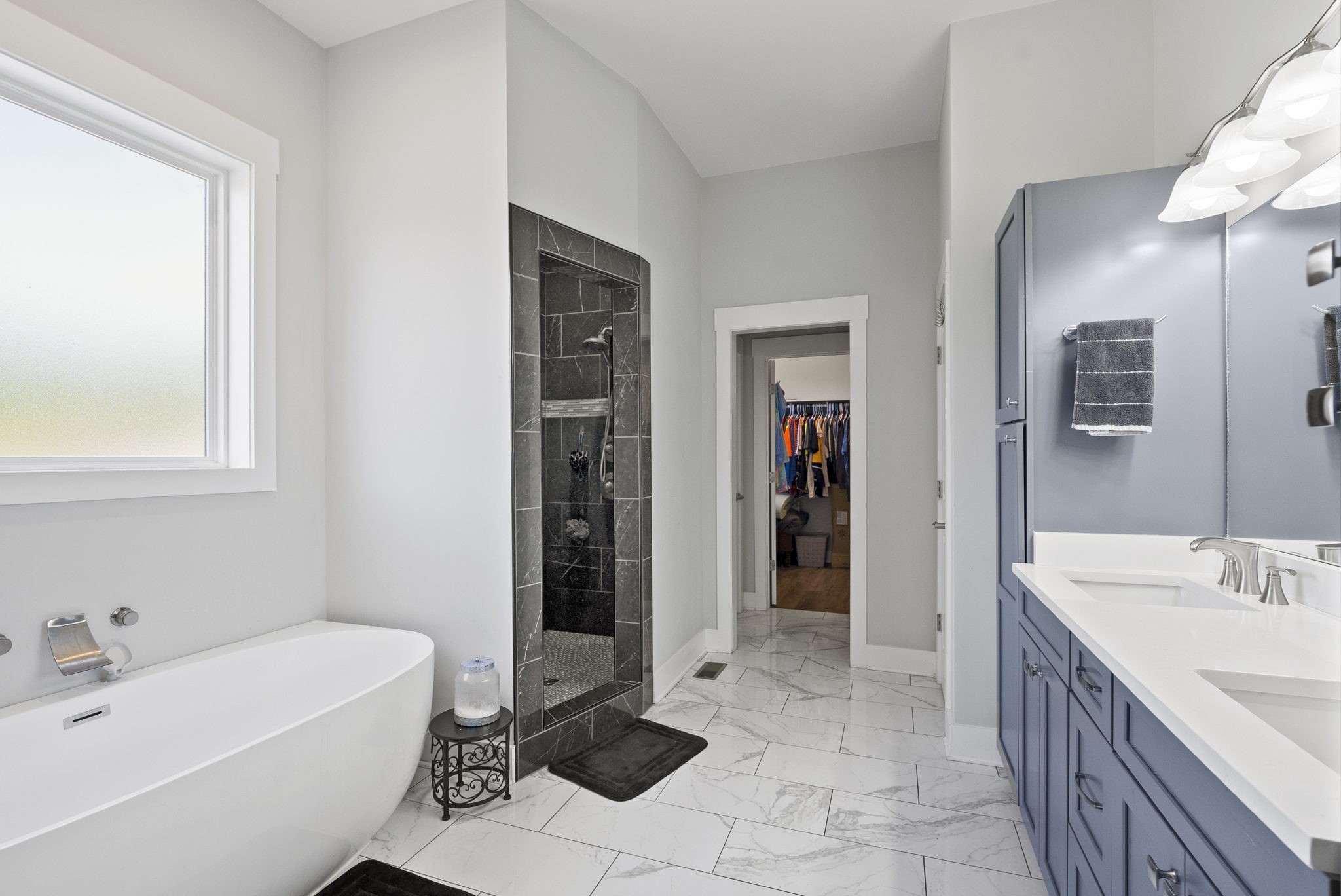 4217 Sandy Springs Road Springfield, TN 37172 - Photo 28 of 50 a bathroom with a tub sink and mirror