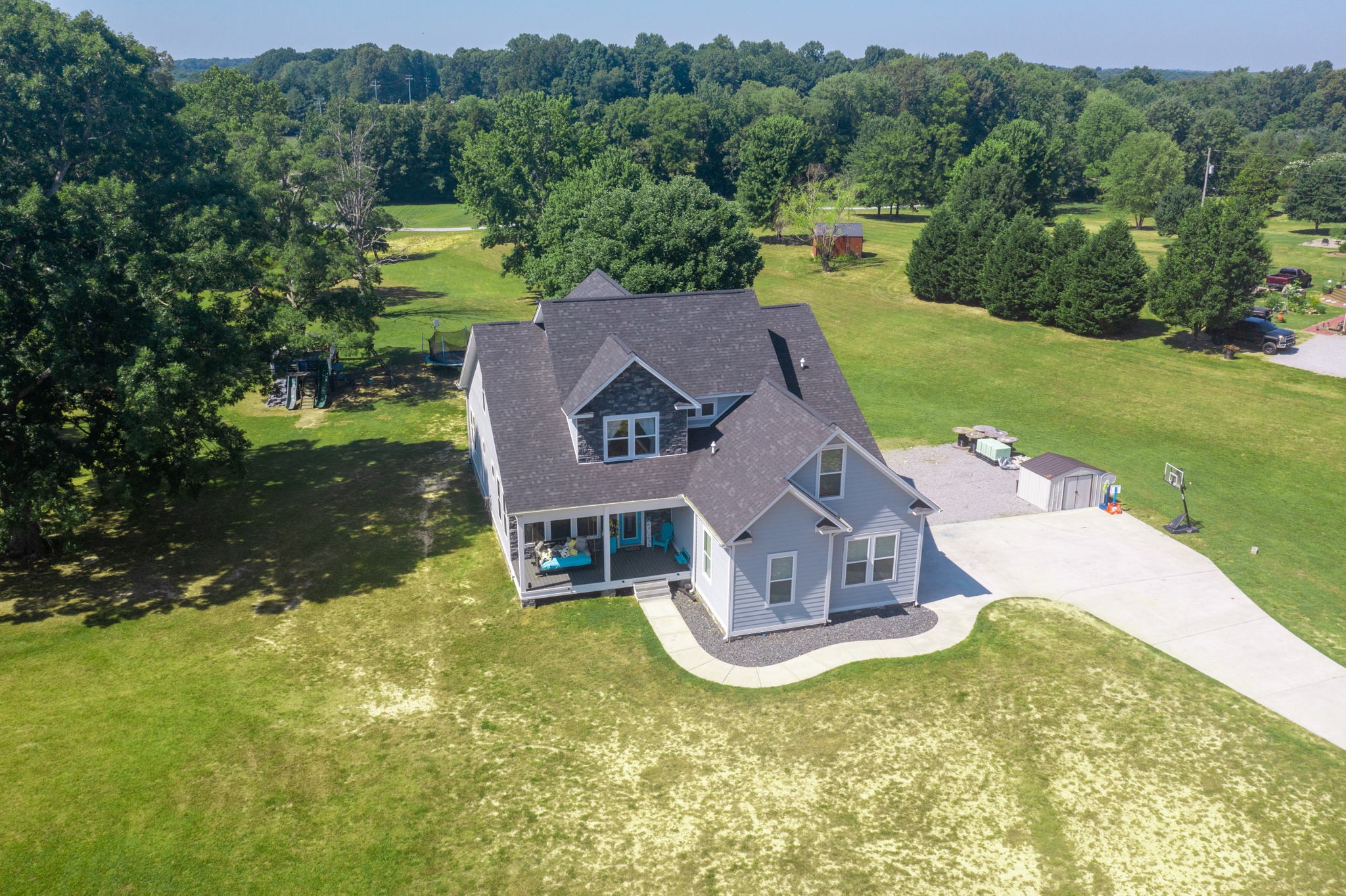 4217 Sandy Springs Road Springfield, TN 37172 - Photo 3 of 50 an aerial view of a house with outdoor space swimming pool and mountain view