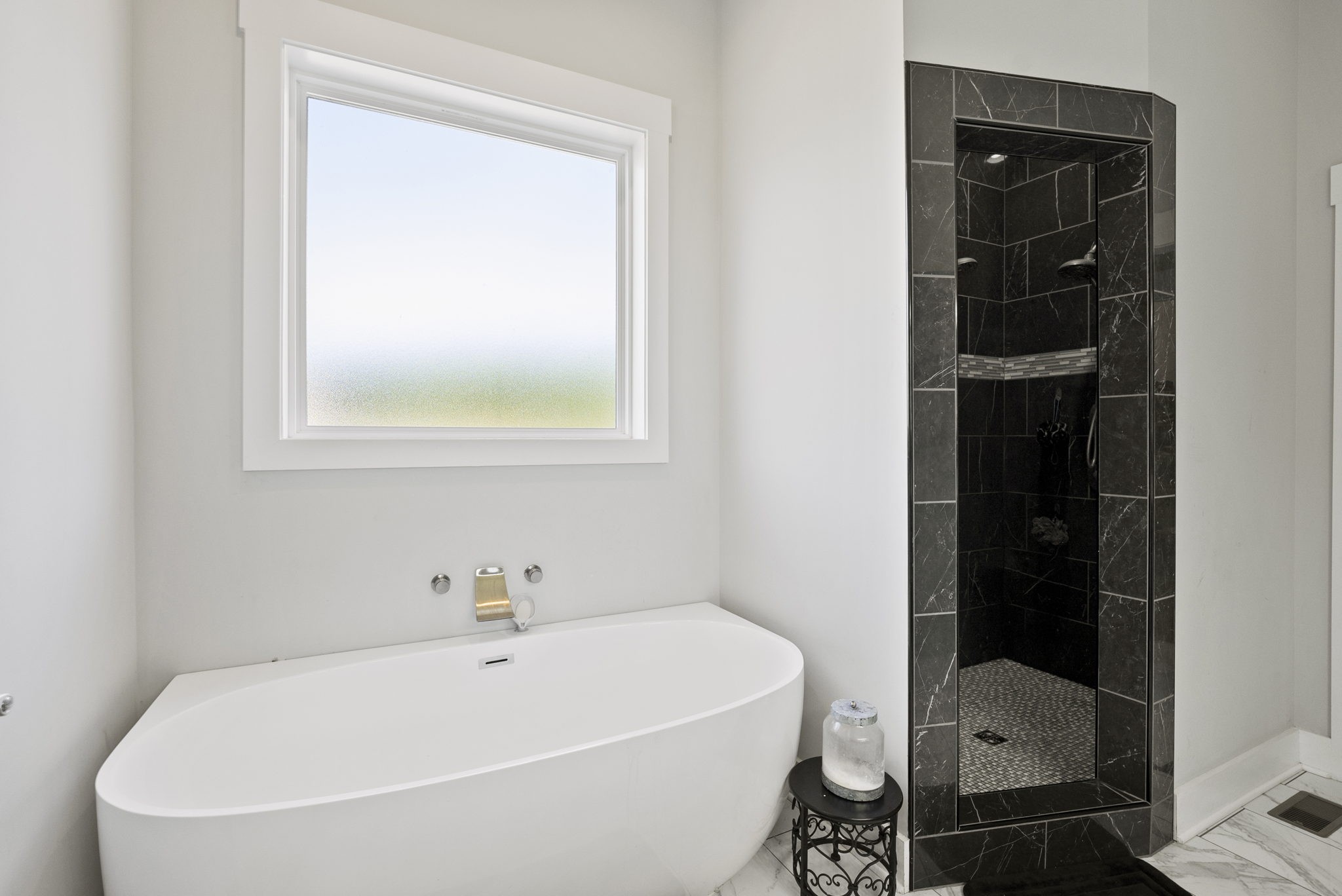4217 Sandy Springs Road Springfield, TN 37172 - Photo 31 of 50 a white bath tub sitting next to a shower