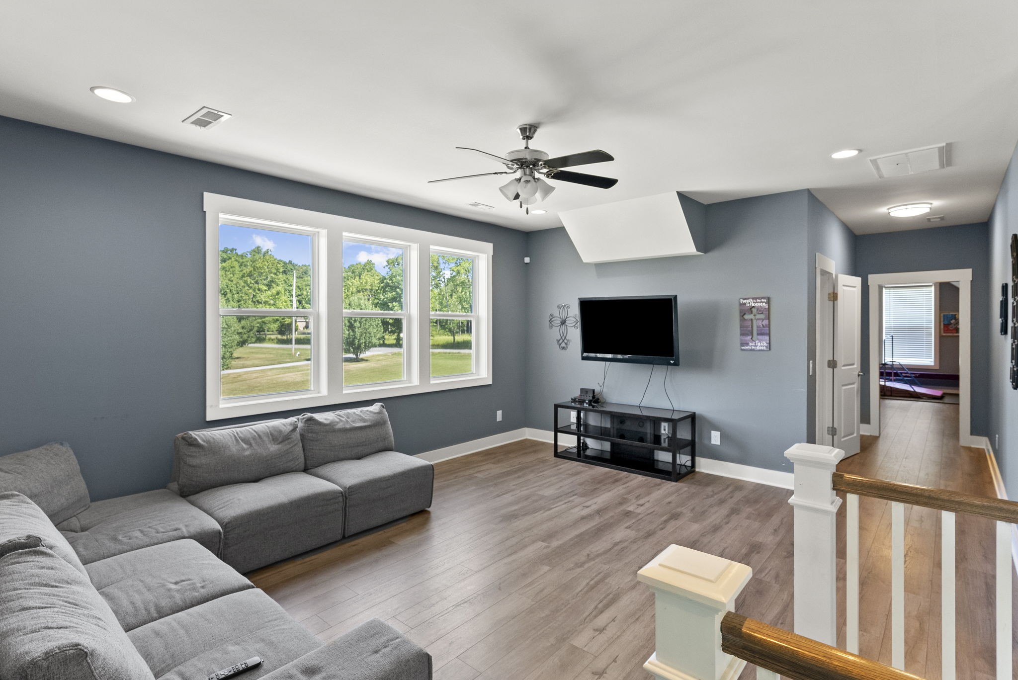 4217 Sandy Springs Road Springfield, TN 37172 - Photo 35 of 50 a living room with furniture and a flat screen tv