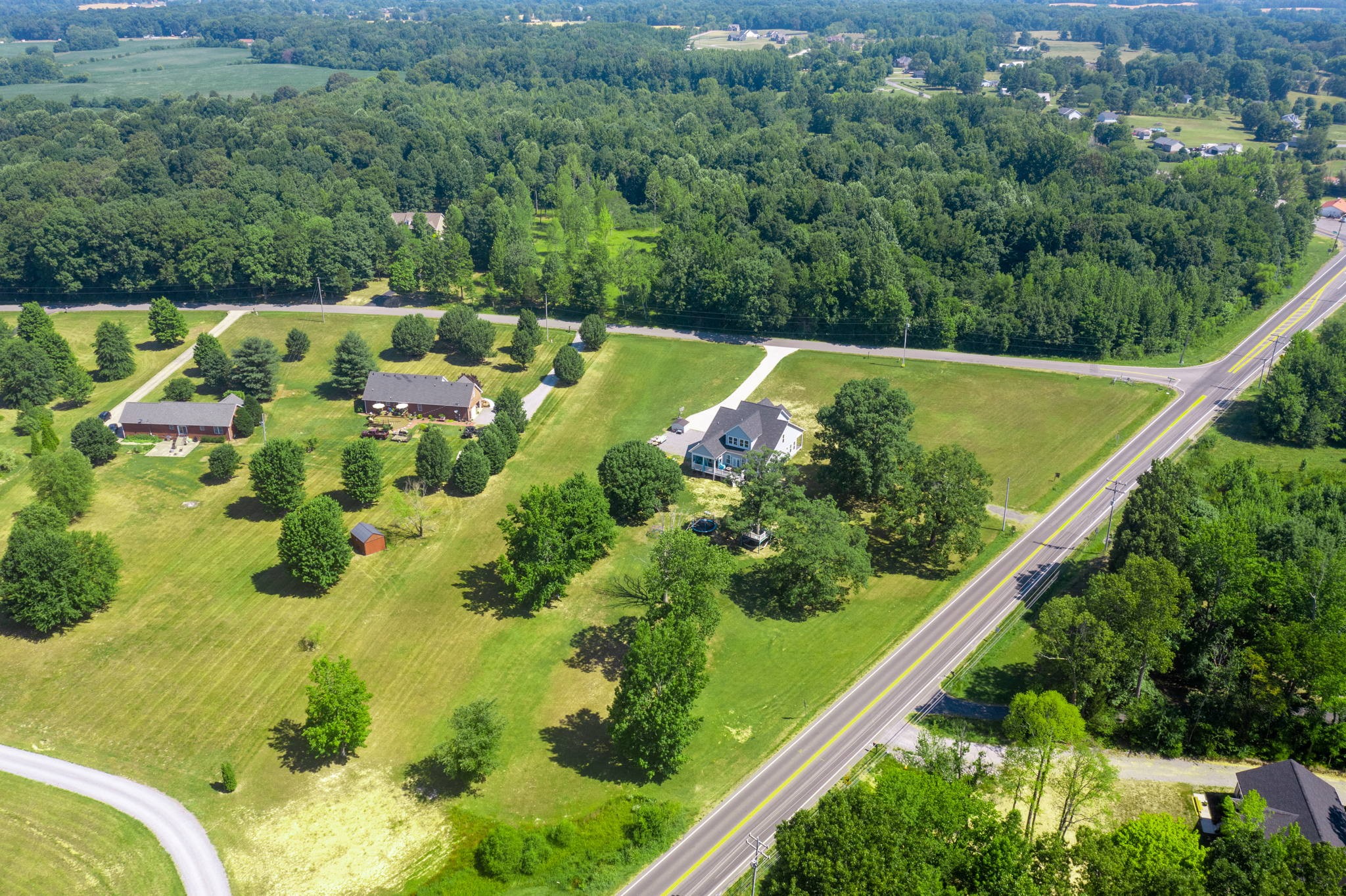 4217 Sandy Springs Road Springfield, TN 37172 - Photo 49 of 50 a view of a garden with a building in the background