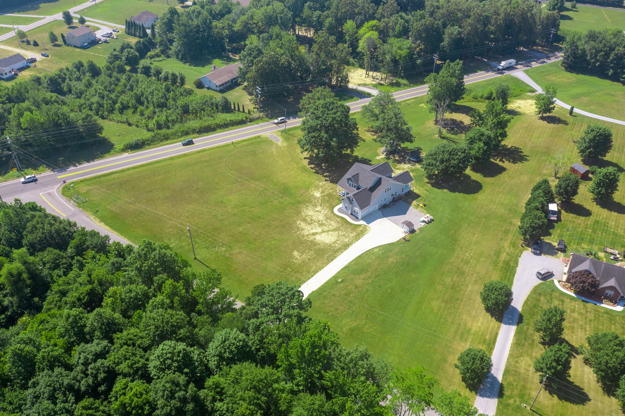 4217 Sandy Springs Road Springfield, TN 37172 - Photo 5 of 50 an aerial view of a residential houses with outdoor space and trees all around