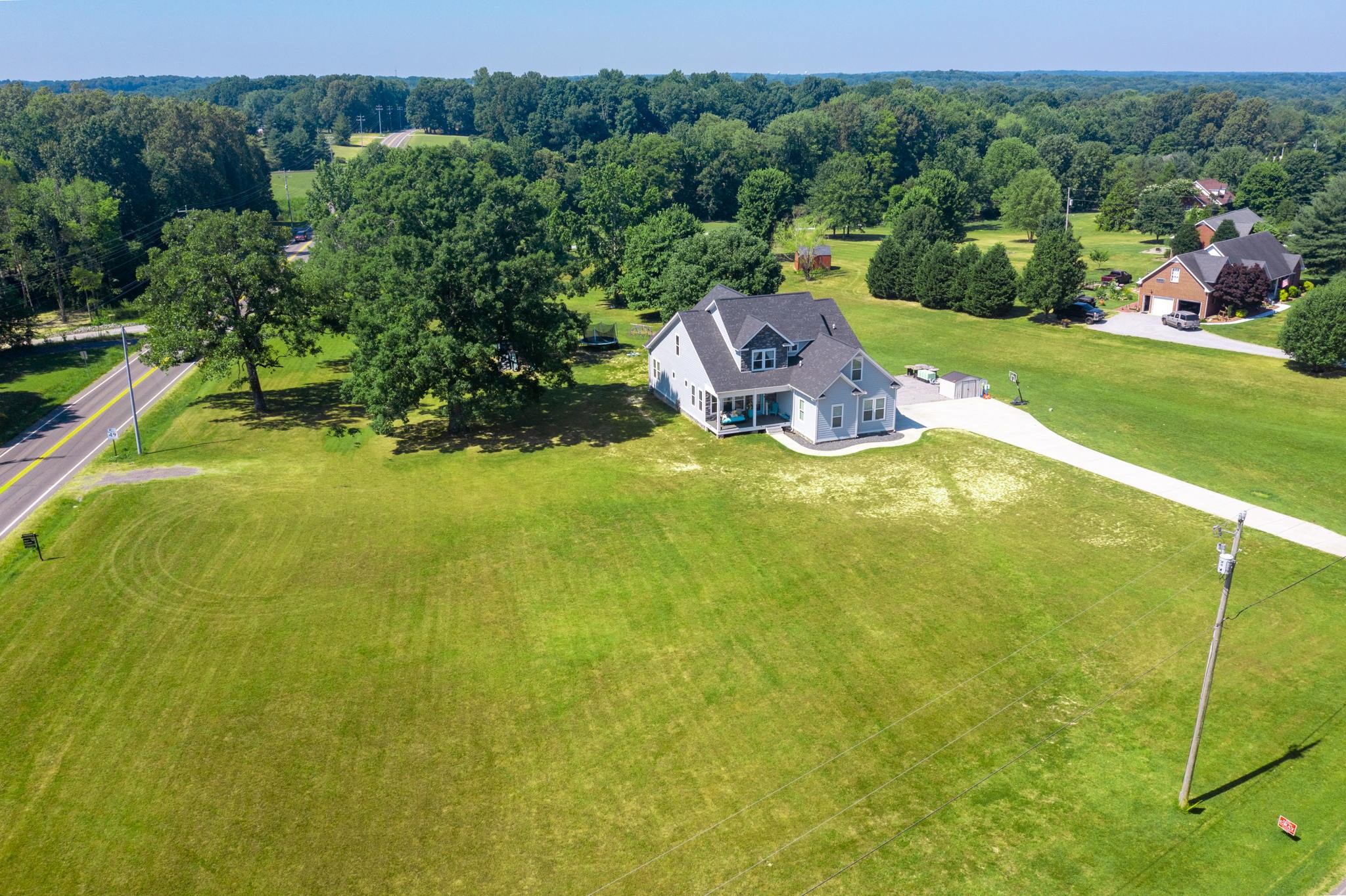 4217 Sandy Springs Road Springfield, TN 37172 - Photo 9 of 50 an aerial view of residential houses with outdoor space and trees