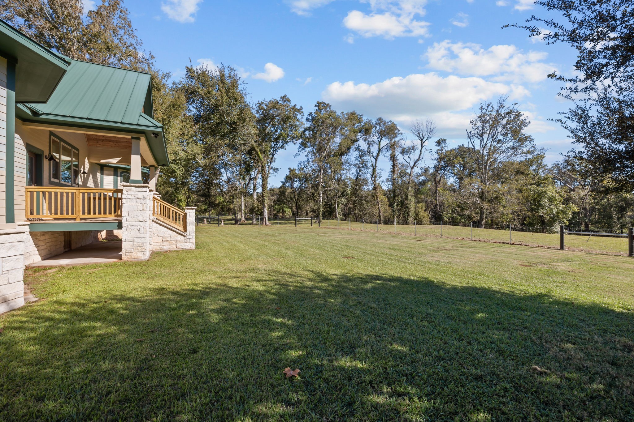 3998 County Road 612 Angleton, TX 77515 - Photo 36 of 47 a view of a house with a yard
