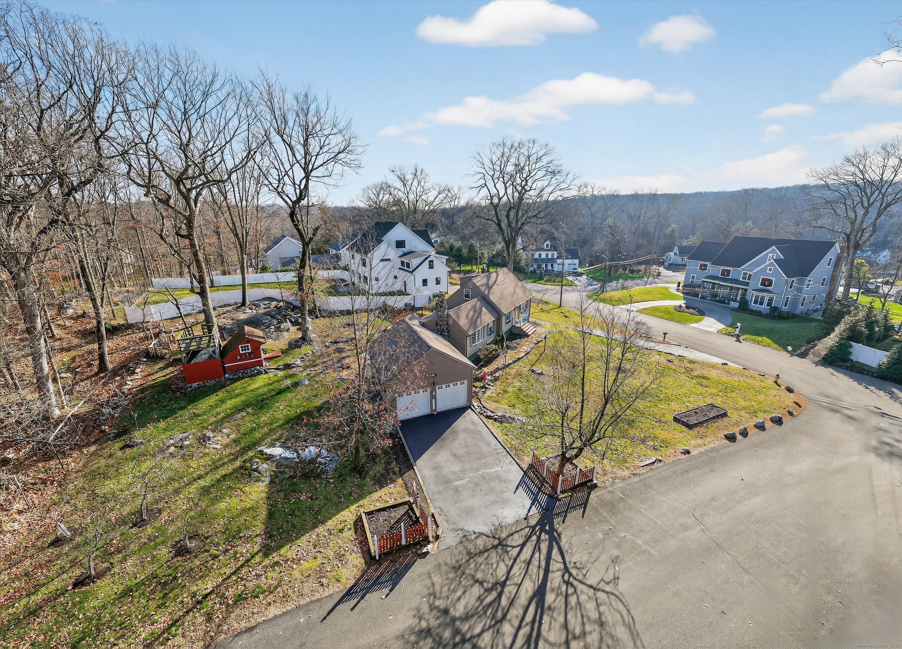 246 Romanock Road Fairfield, CT 06825 - Photo 1 of 37 a view of a swimming pool with a patio