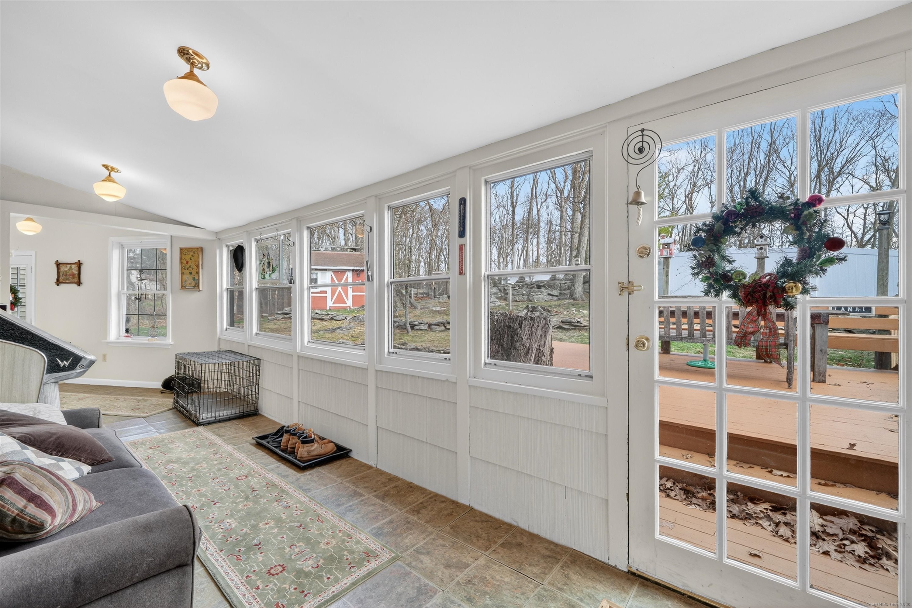 246 Romanock Road Fairfield, CT 06825 - Photo 18 of 37 a bedroom with furniture and a window