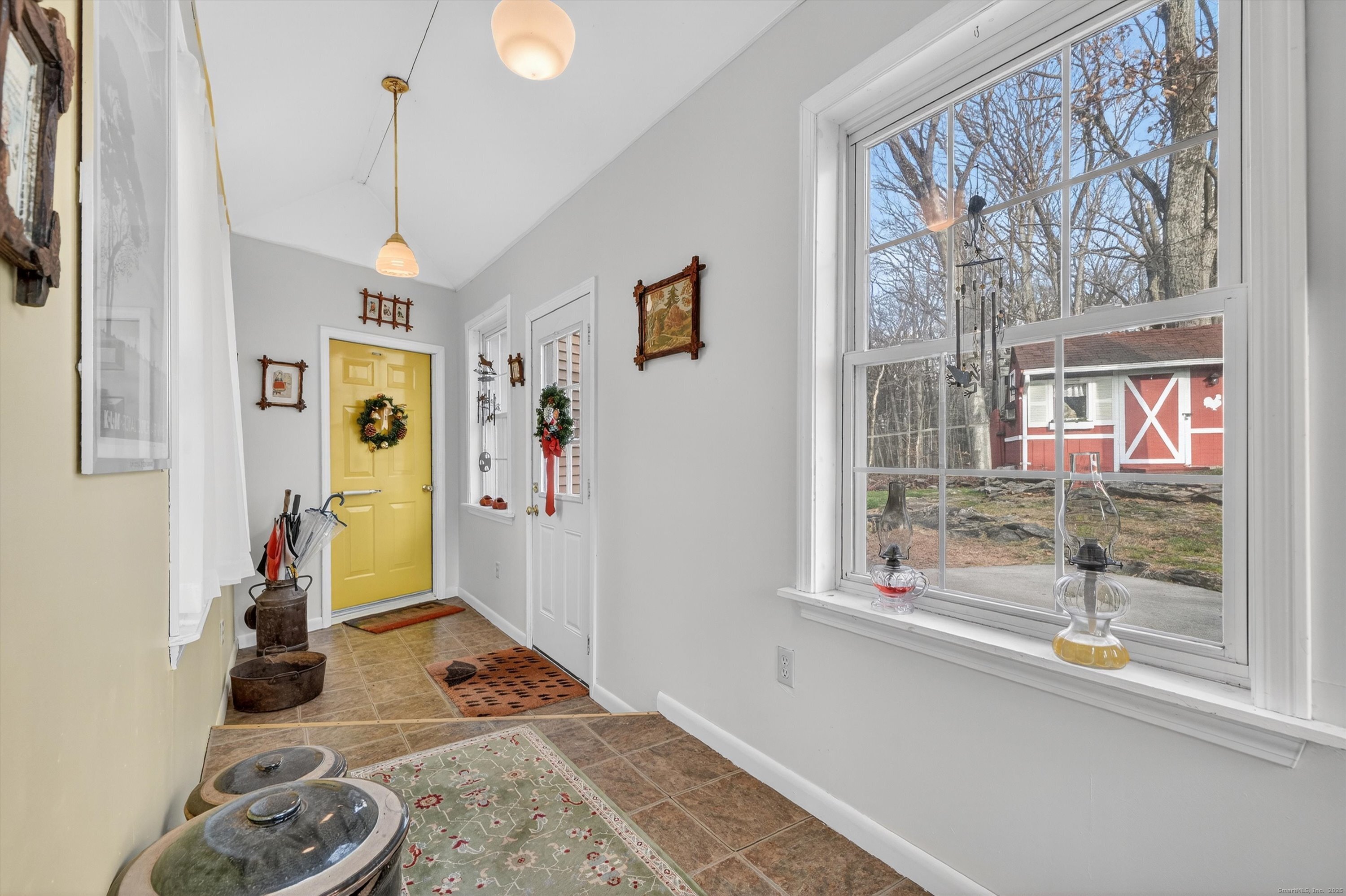 246 Romanock Road Fairfield, CT 06825 - Photo 20 of 37 a bedroom with furniture and a window