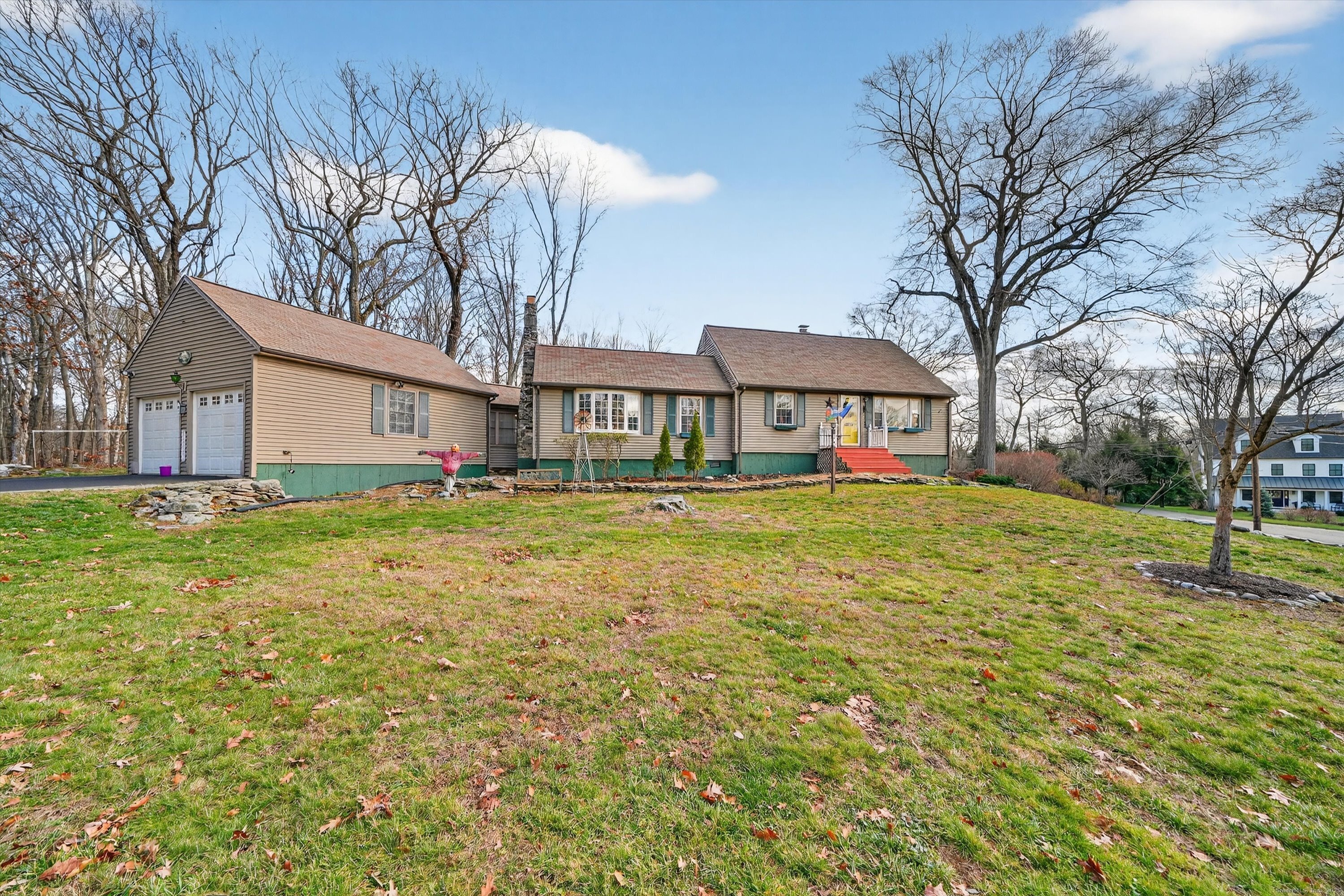 246 Romanock Road Fairfield, CT 06825 - Photo 2 of 37 a house view with swimming pool in front of it