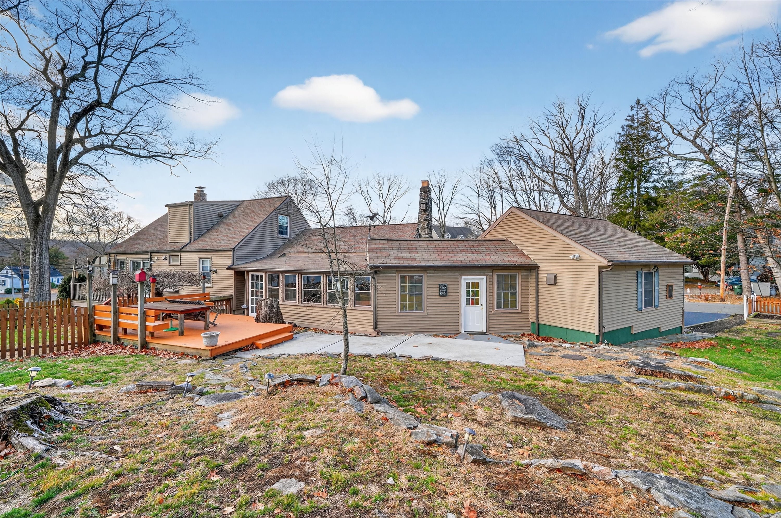 246 Romanock Road Fairfield, CT 06825 - Photo 28 of 37 front view of a house with a yard