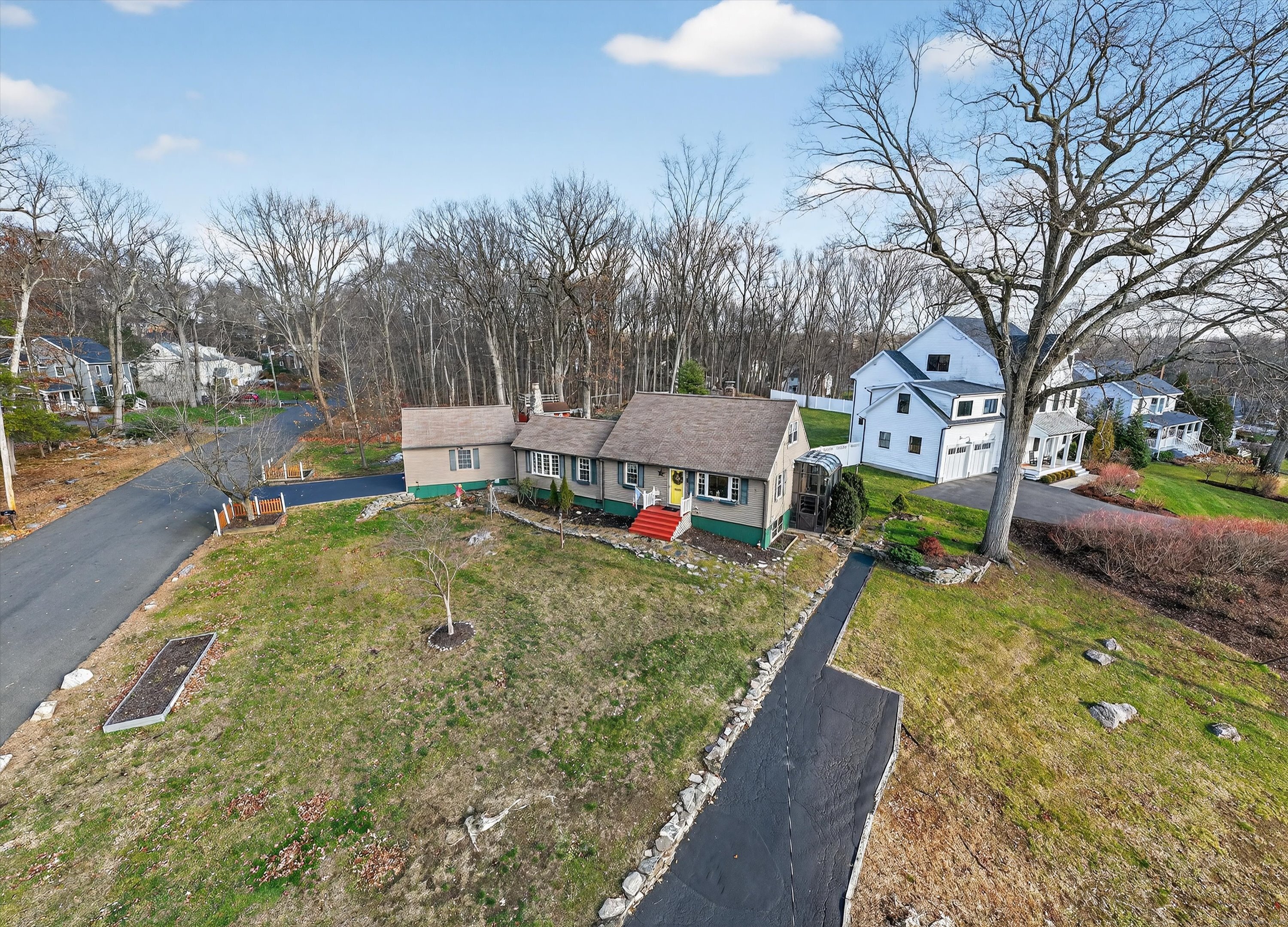 246 Romanock Road Fairfield, CT 06825 - Photo 29 of 37 a view of a house with a yard