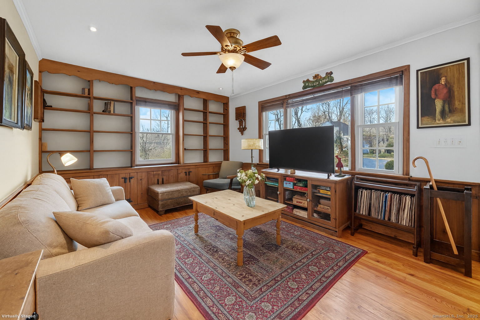 246 Romanock Road Fairfield, CT 06825 - Photo 4 of 37 a living room with furniture and a flat screen tv