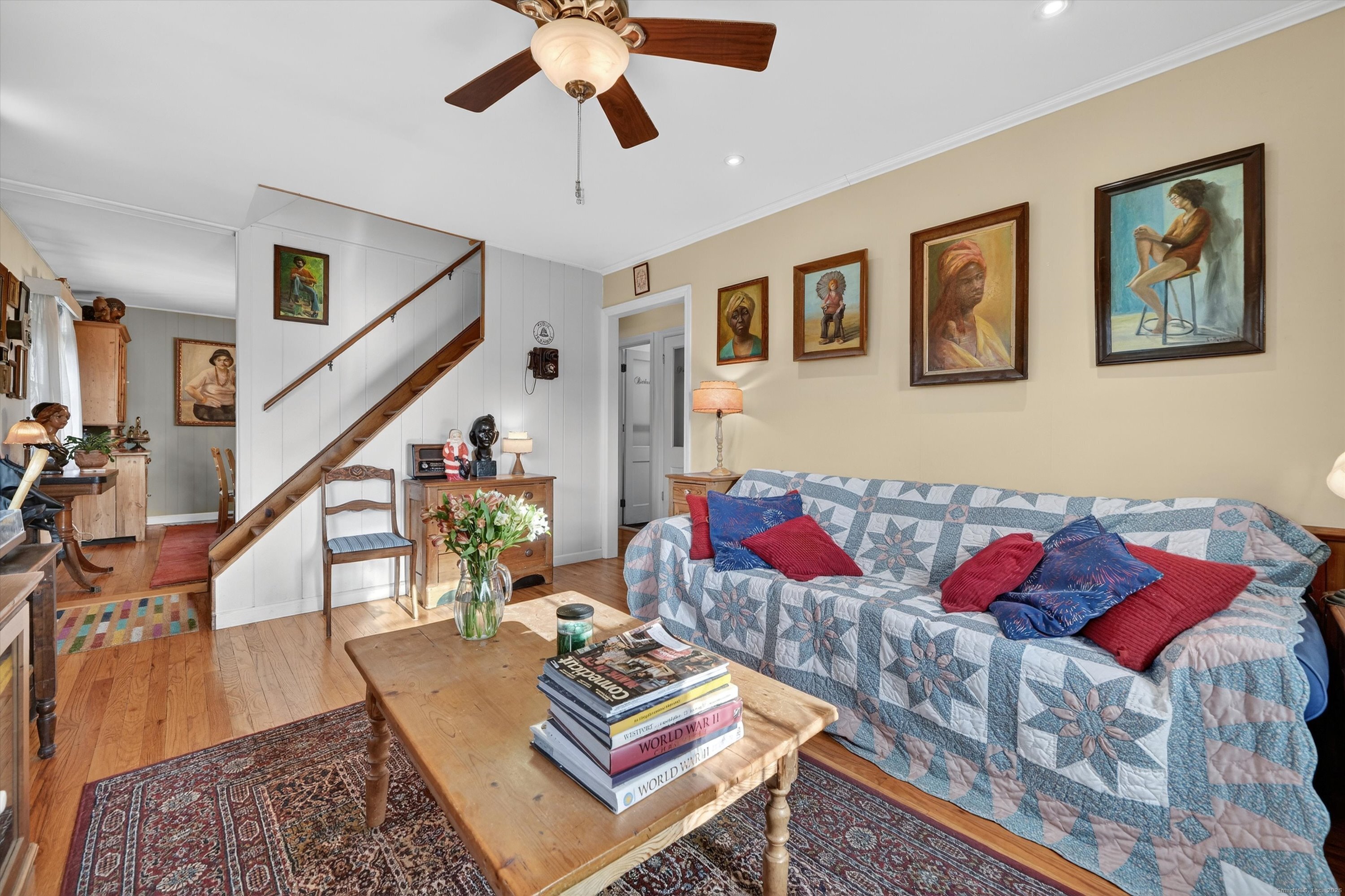 246 Romanock Road Fairfield, CT 06825 - Photo 7 of 37 a living room with lots of furniture and a rug